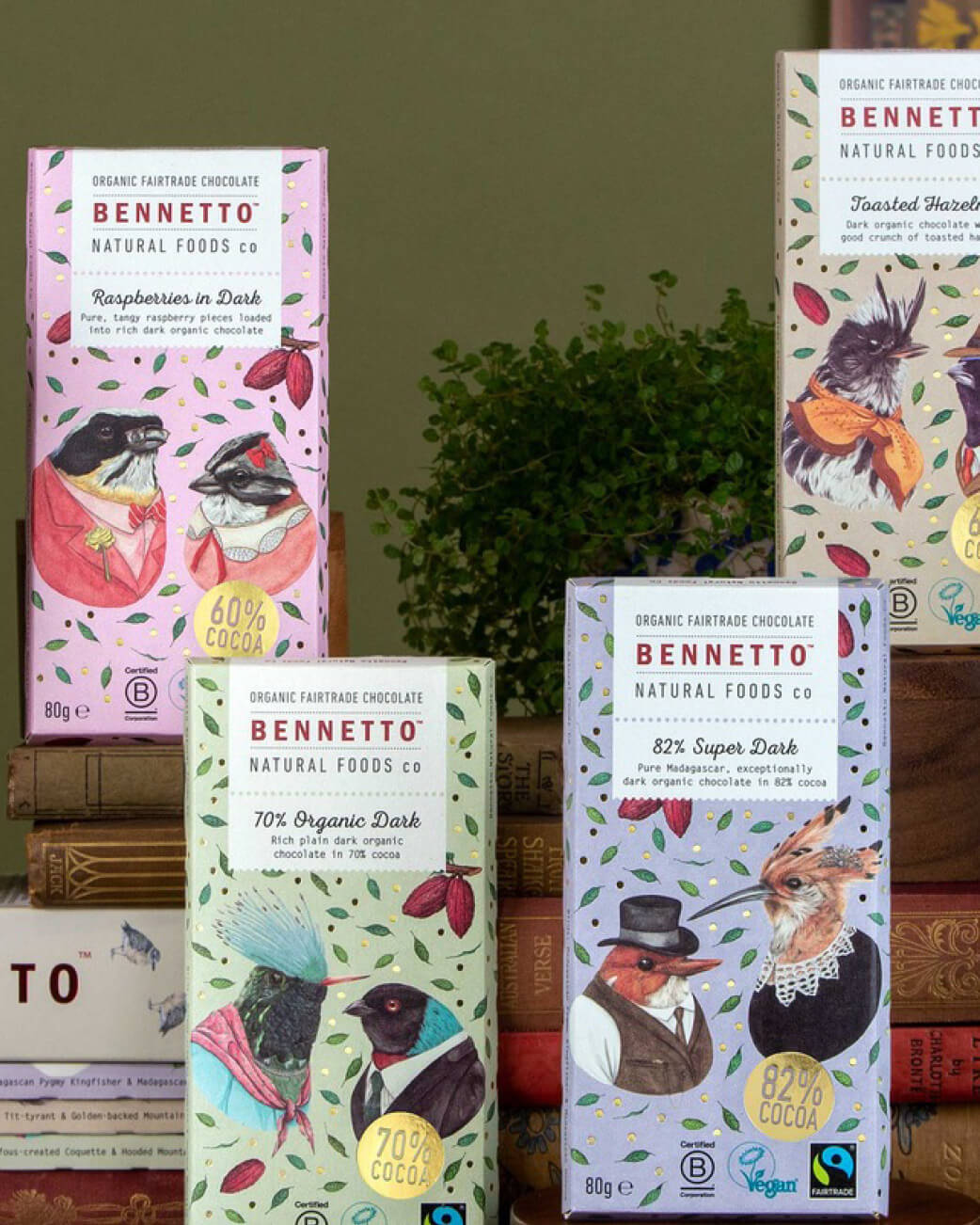 Bennetto chocolate bars with colorful packaging on a wooden surface.