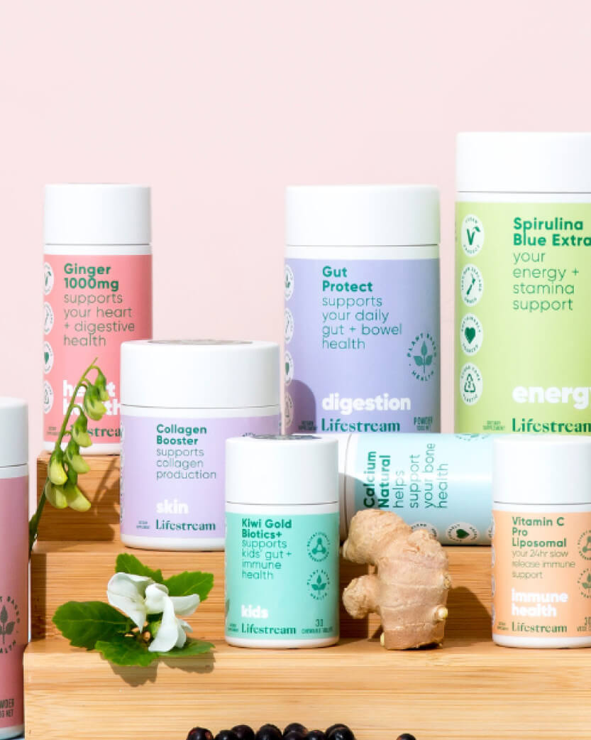 Collection of Lifestream supplements on a wooden shelf with a pink background.