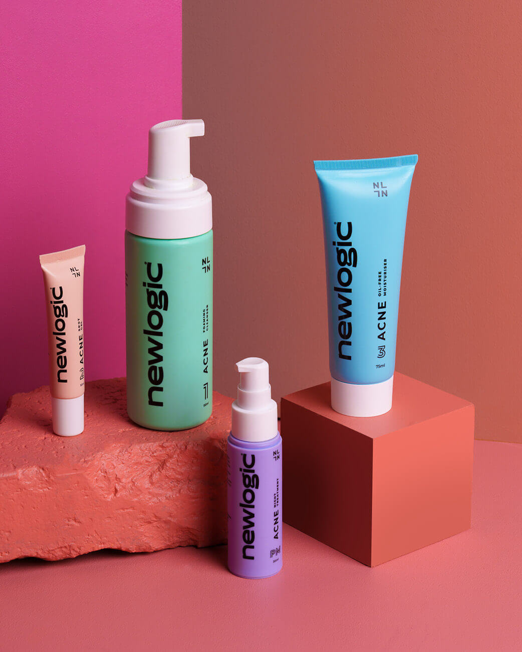 NewLogic skincare products on a colourful background.