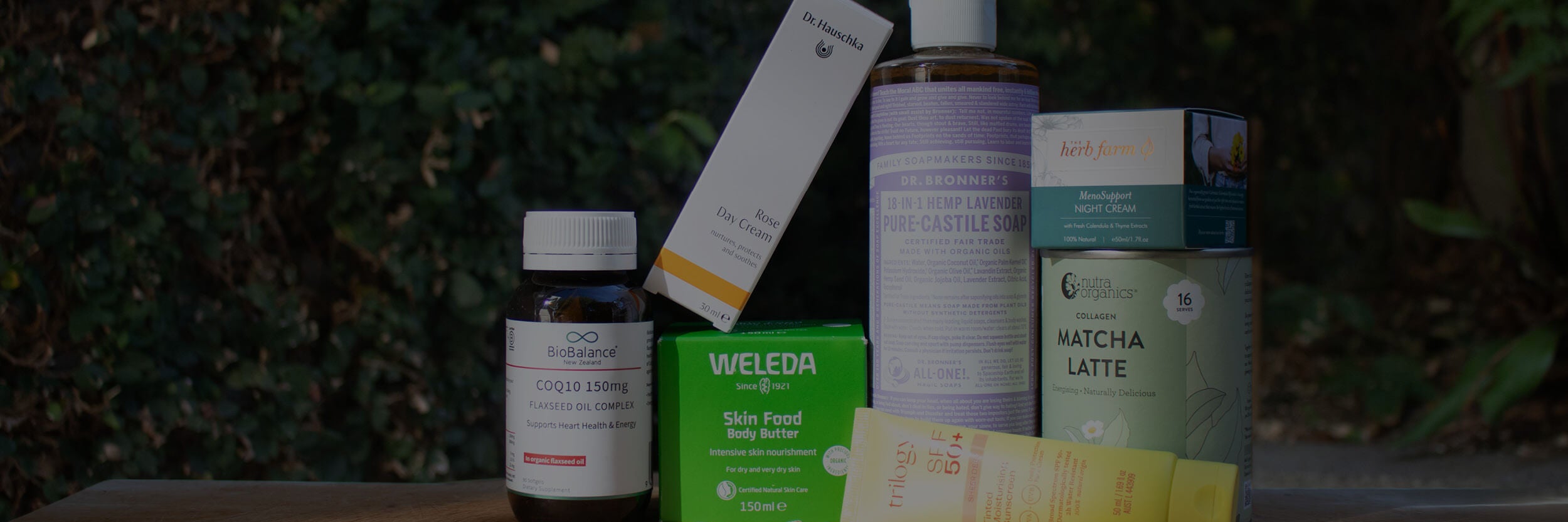 Wellness products stacked on top of each other against a blurred background.