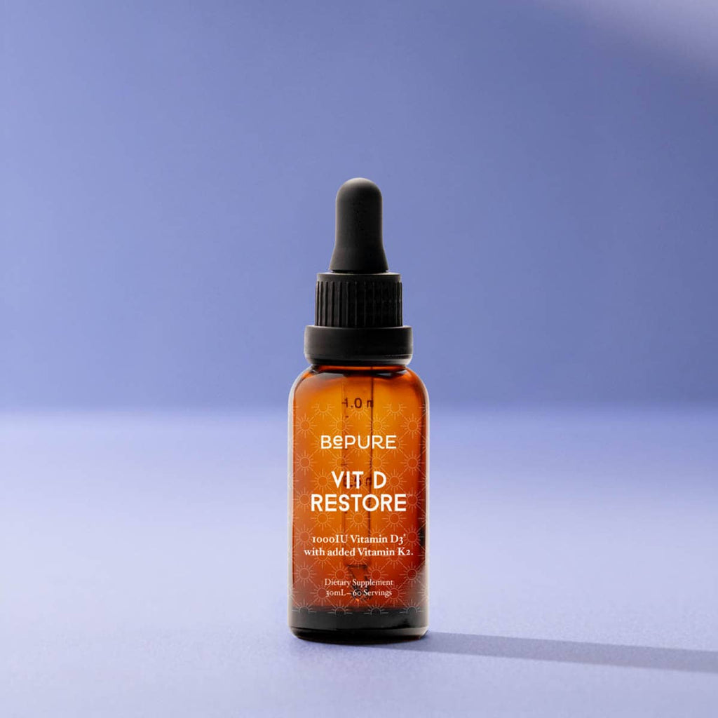 Bottle of Bepure Vitamin D Restore on a gradient blue background