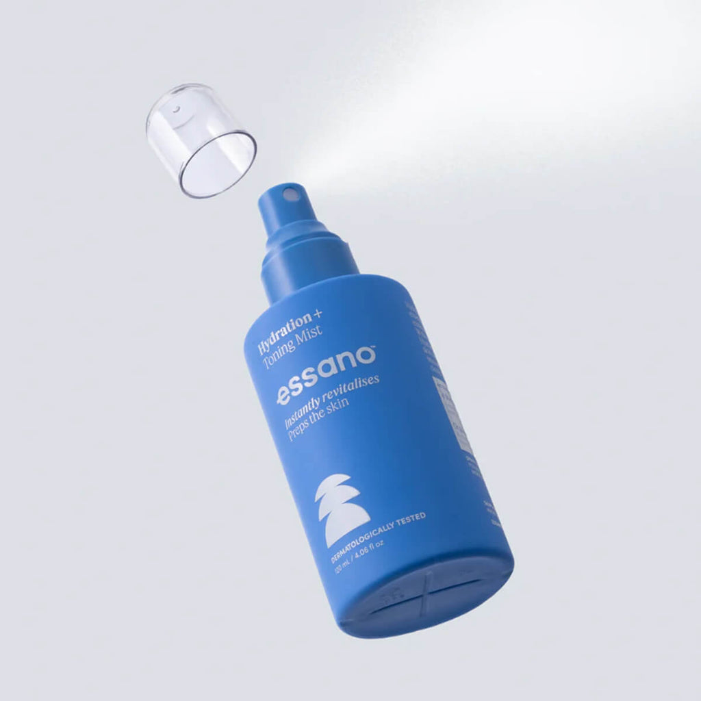 Blue spray bottle labeled 'essano' on a light gray background.