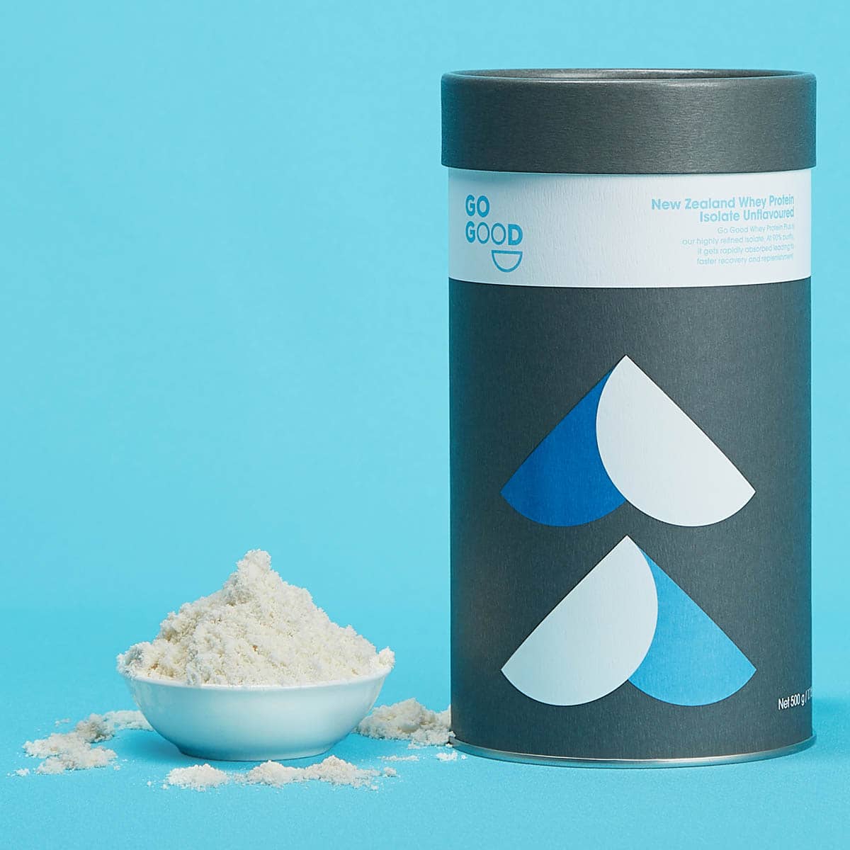 Container of 'GO GOOD' brand powder with a small bowl of powder on a blue background.