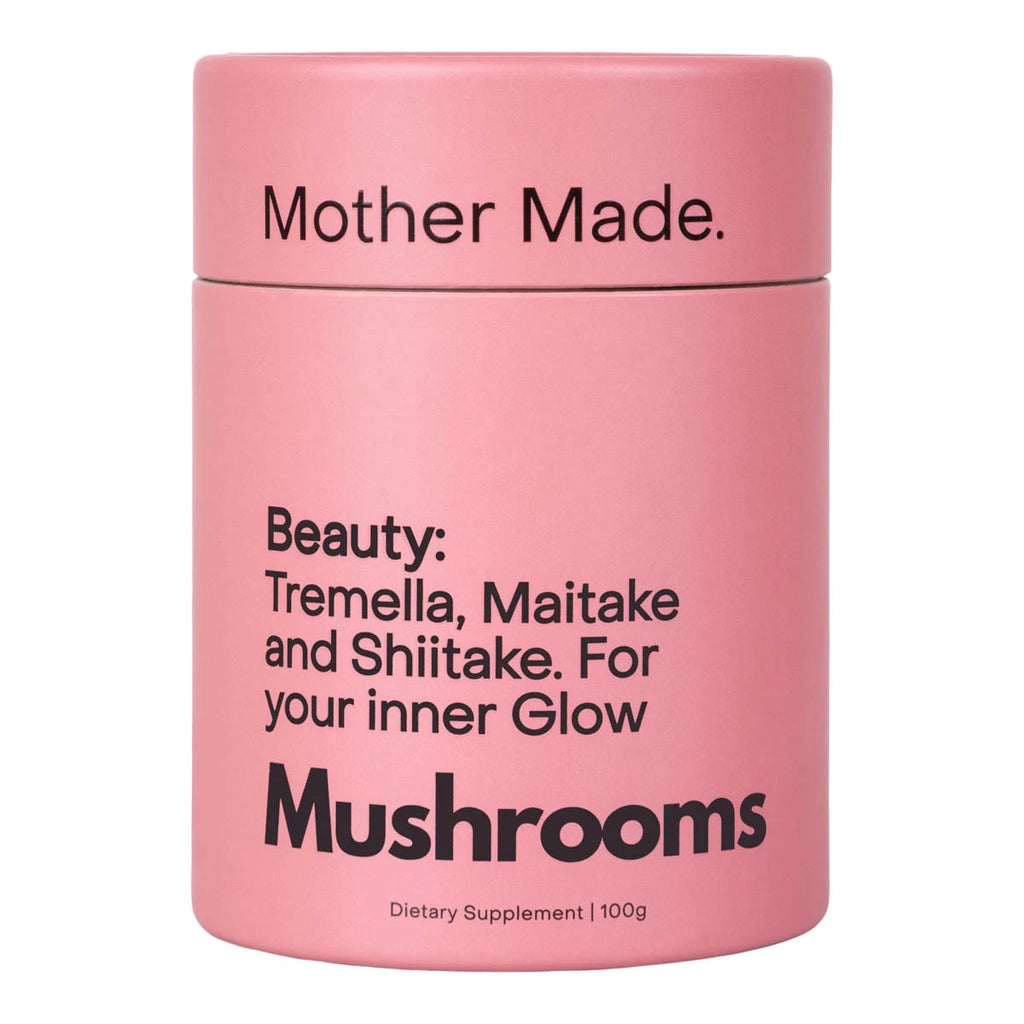 Pink container labeled 'Mother Made' with mushroom supplement text on a white background