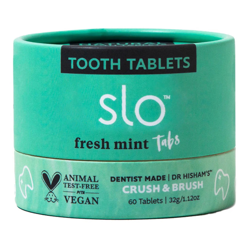 A mint green cylindrical container of slo fresh mint Tabs tooth tablets, featuring white and black text on a clean white background.
